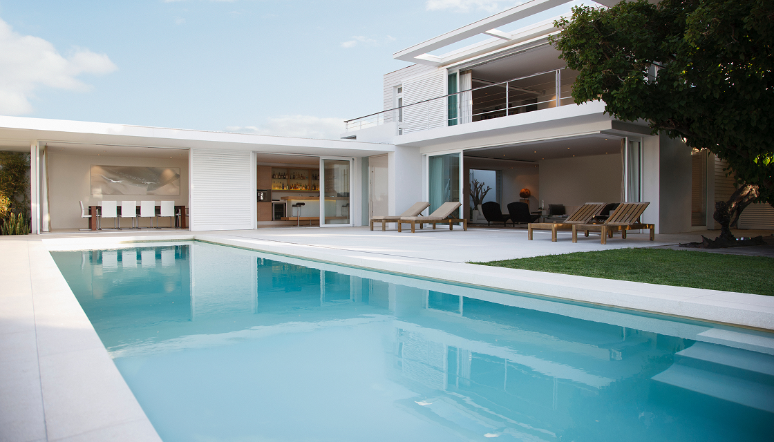 Luxurious villa exterior with pool